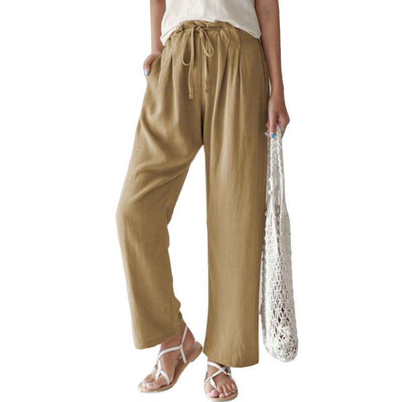 Ladies casual linen pants with wide legs, elastic waistband and side pockets Mune Fashion