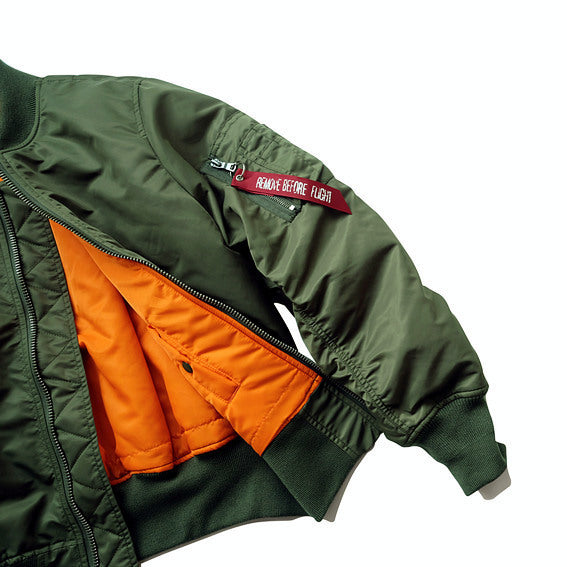 Men's flight bomber jacket with contrasting inner lining, utility arm pocket, and ribbed cuffs Mune Fashion