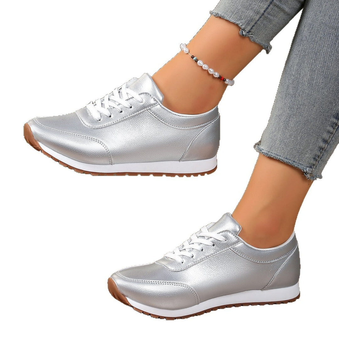 Women's lightweight lace-up sneakers made of synthetic leather with padded comfort insole and profiled rubber sole Mune Fashion