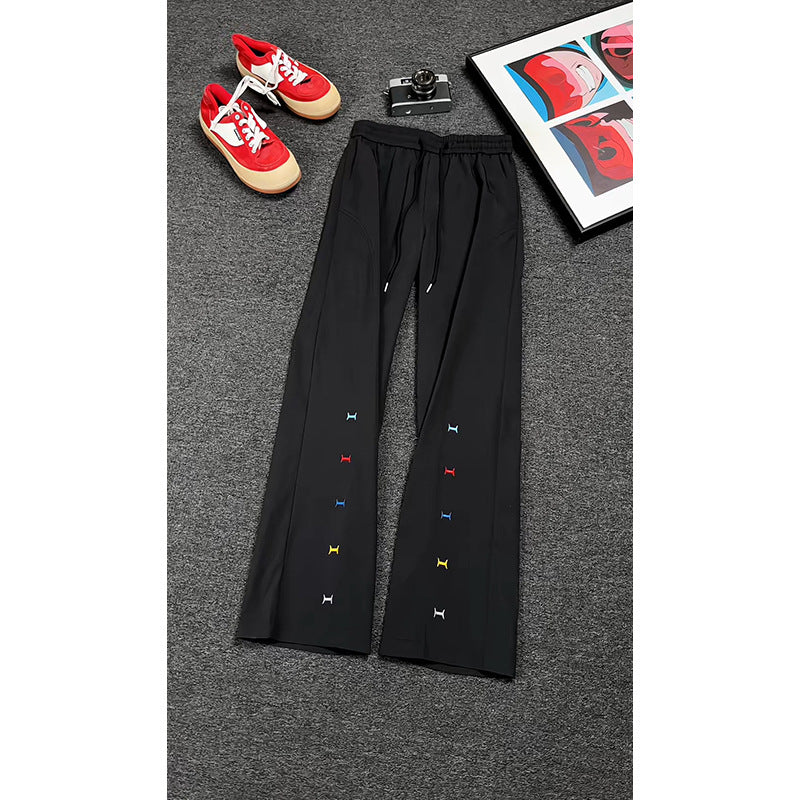 Women's sporty leisure pants with elastic waistband and colorful detail Mune Fashion