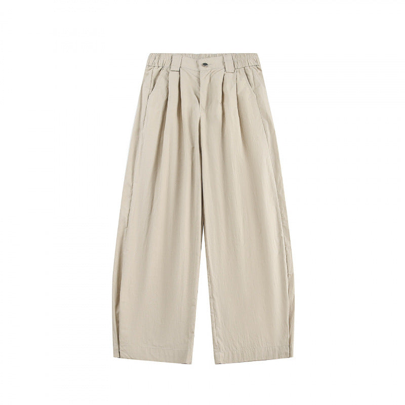 Women's wide high-waisted culotte pants with pleats, elastic waistband, and side pockets Mune Fashion