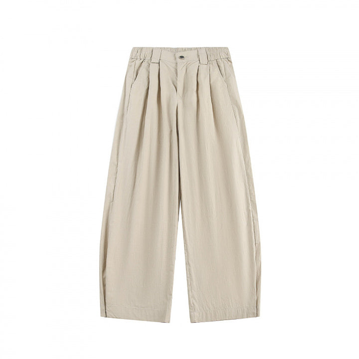 Women's wide high-waisted culotte pants with pleats, elastic waistband, and side pockets Mune Fashion