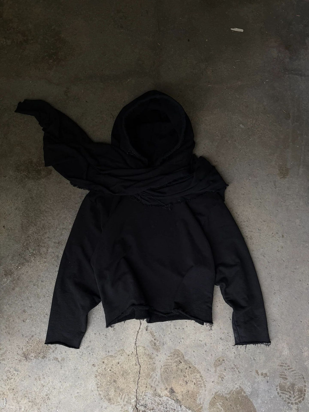 Unisex hooded pullover in usage marks style with attached tube scarf and frayed openings Mune Fashion