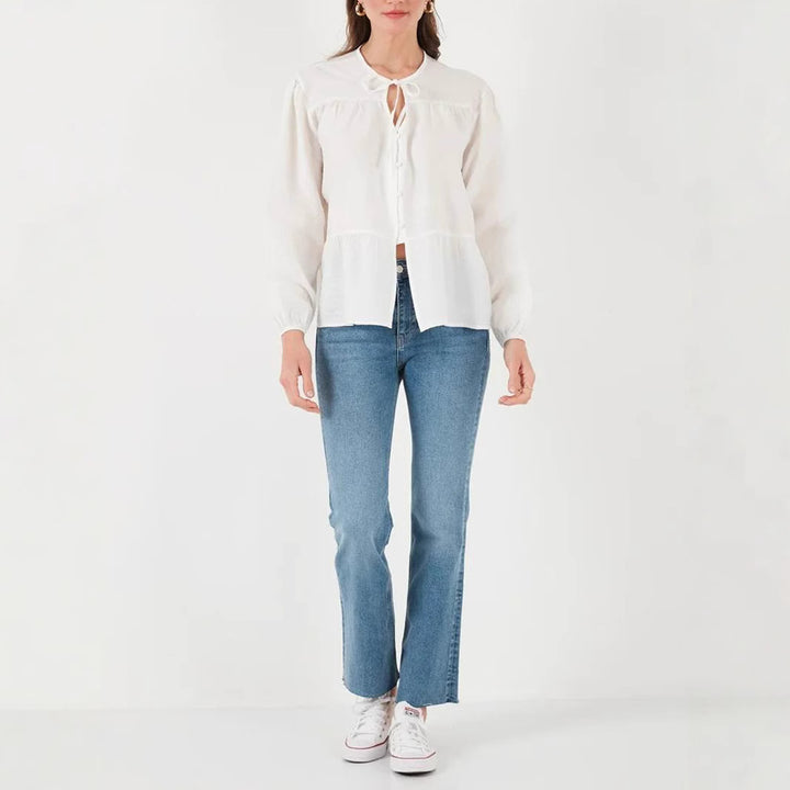 Women's loose-fitting cotton blouse with ruffle tier and tie collar Mune Fashion