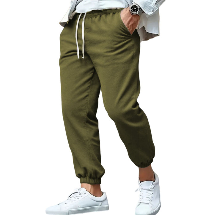 Men's nan tapered sweat joggers with elastic waistband, drawstring, and cuffed hems Mune Fashion