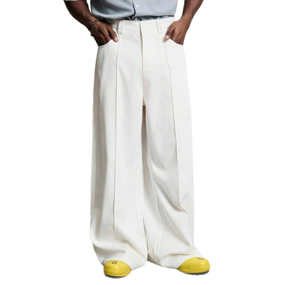 Men's wide pleated pants with high waistband, precise creases, and side inset pockets Mune Fashion