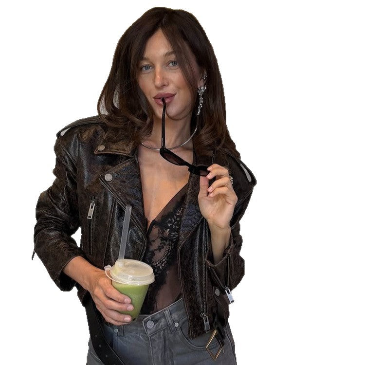 Women short cut biker jacket made of textured faux leather with waist belt Mune Fashion