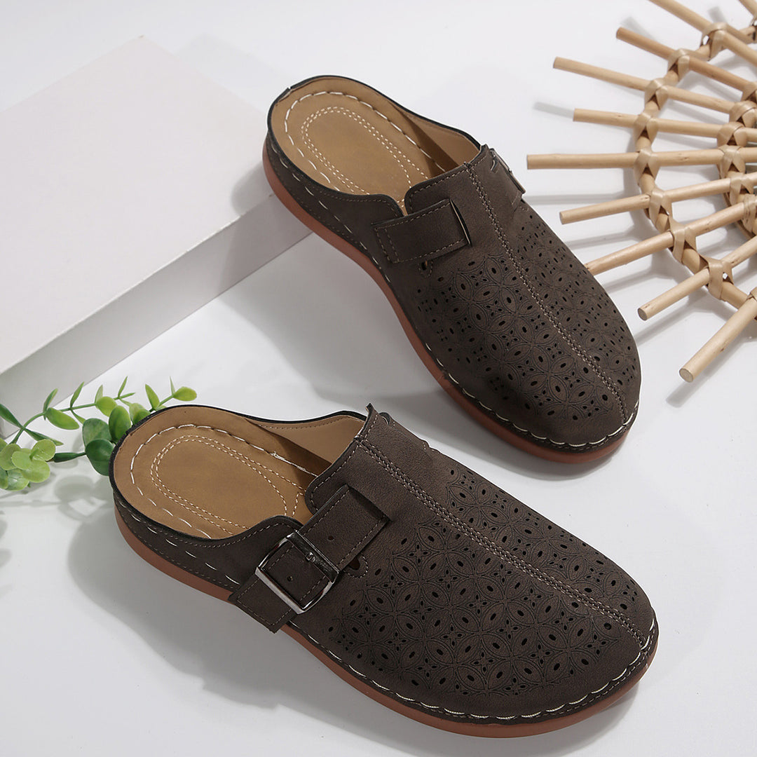 Damen Perforierte Komfort-Mules mit Zierlochmuster, verstellbarem Schnallenriemen und gepolstertem Fußbett Mune Fashion