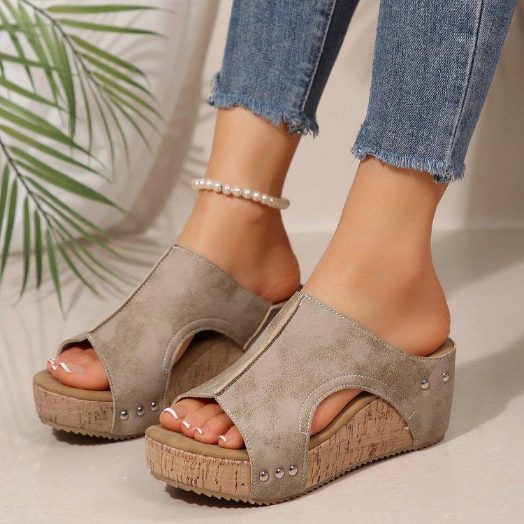 Women’s wedge sandals with heel strap, ergonomic footbed, cork look platform, and padded toe area Mune Fashion