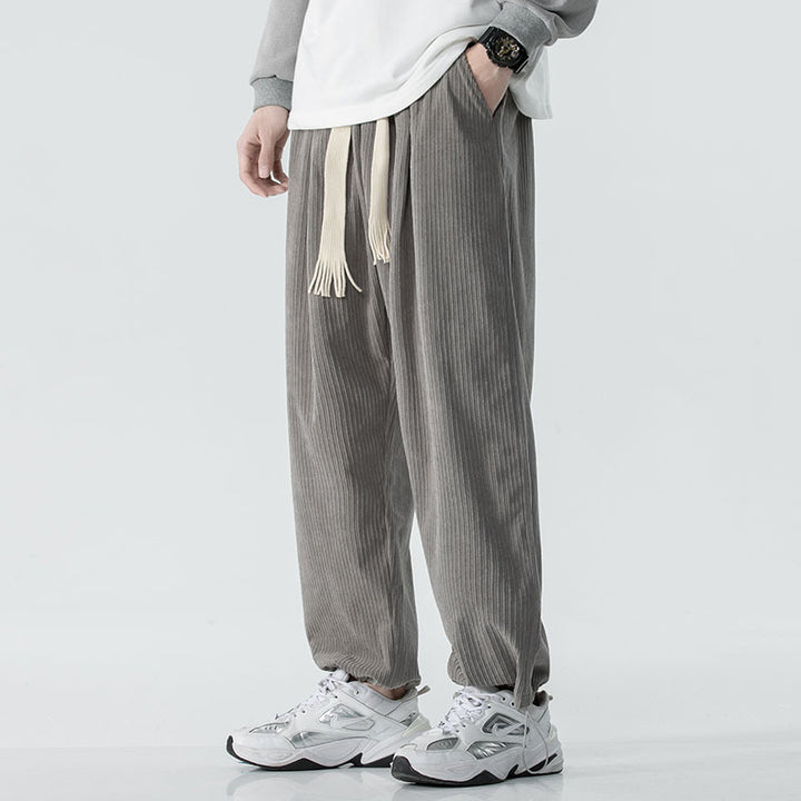 Men's loose-fitting corduroy pants with wide leg, elastic waistband and decorative drawstring Mune Fashion