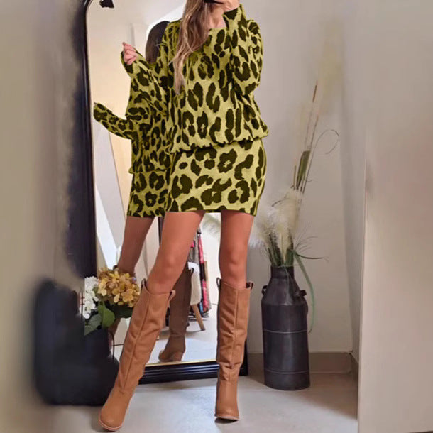 Women's cozy knitted two-piece set with loose round neck sweater and high-waisted mini skirt in animal print Mune Fashion