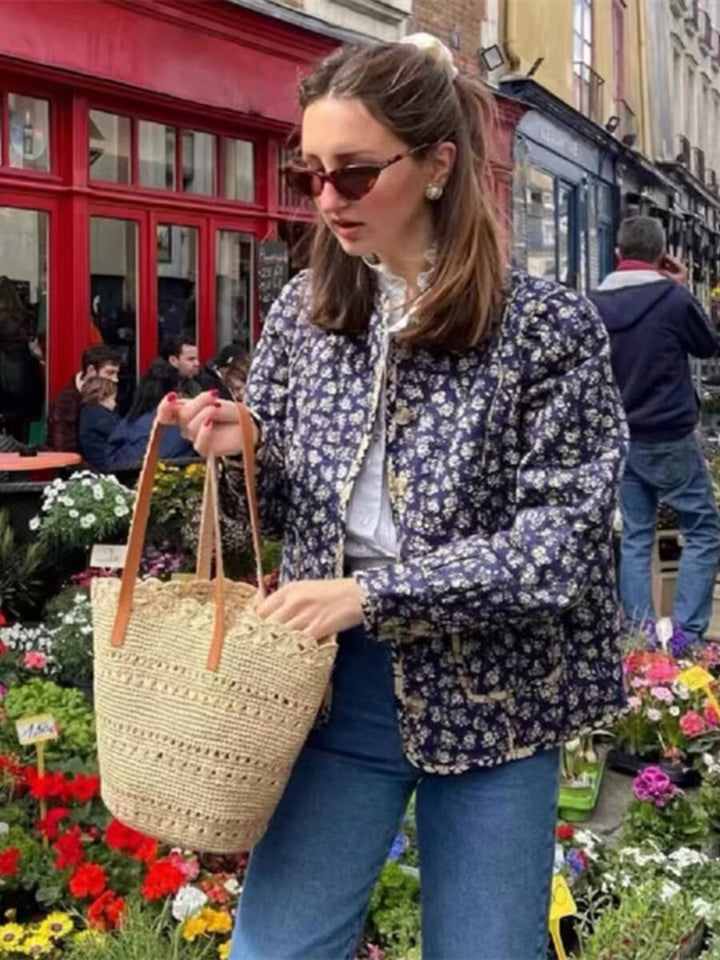 Women's quilted jacket with floral all-over pattern, round neckline and patch pockets Mune Fashion
