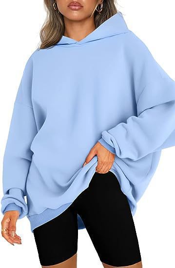Women's oversized hoodie in longline cut with raglan sleeves and soft inner lining Mune Fashion