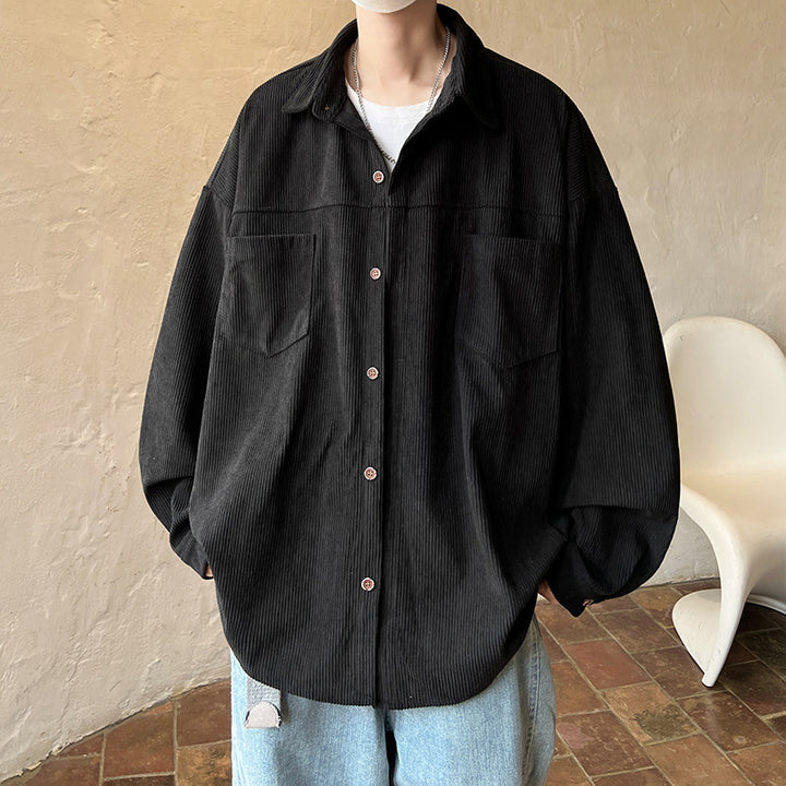 Men's oversized cord shirt jacket with stitched breast pockets, rounded hem, and loose silhouette Mune Fashion