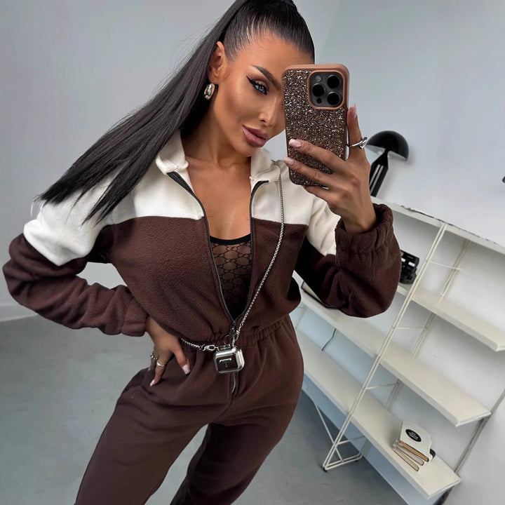 Ladies cozy fleece jumpsuit with hood, full-length zipper and elastic cuffs Mune Fashion