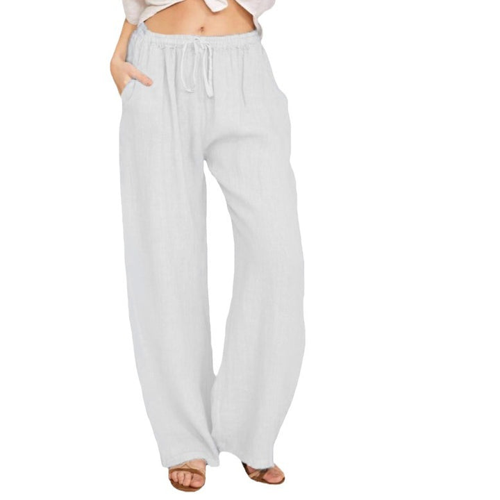 Women's airy palazzo pants with drawstring waistband, elastic waist finish, and side pockets Mune Fashion