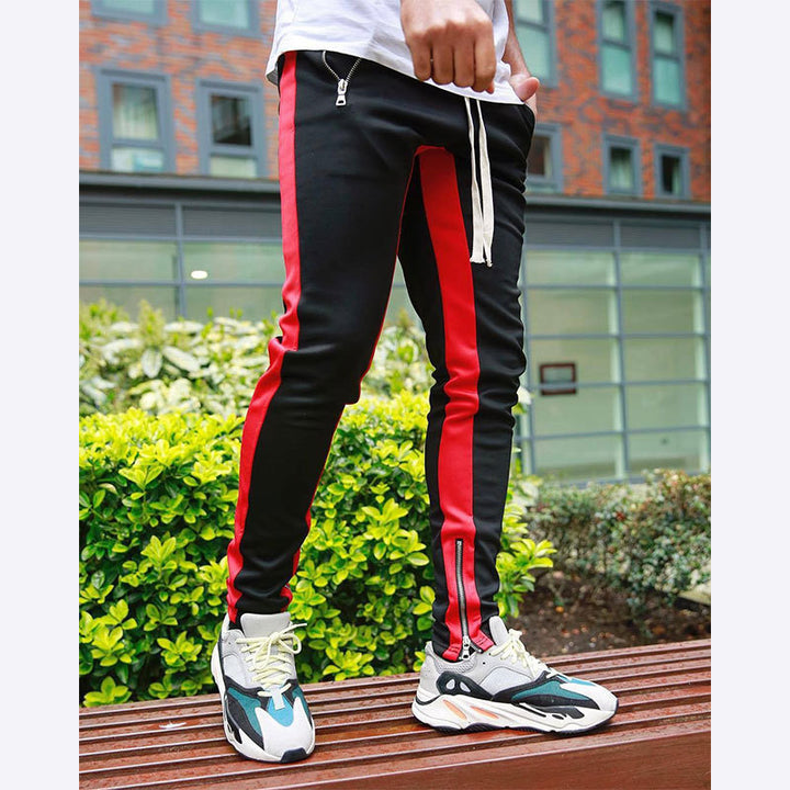 Men's narrow jogging pants with side contrast stripe, drawstring and ankle zipper Mune Fashion