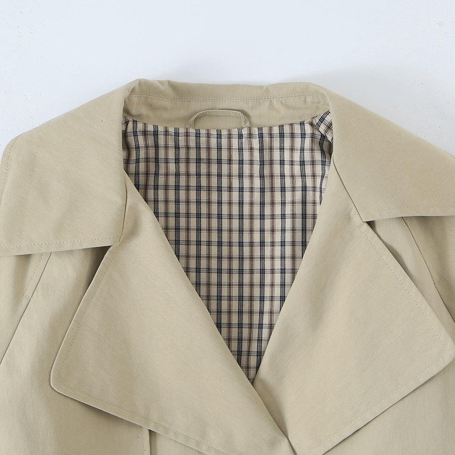 Women's short trench-style jacket with adjustable drawstring and eye-catching lapel Mune Fashion