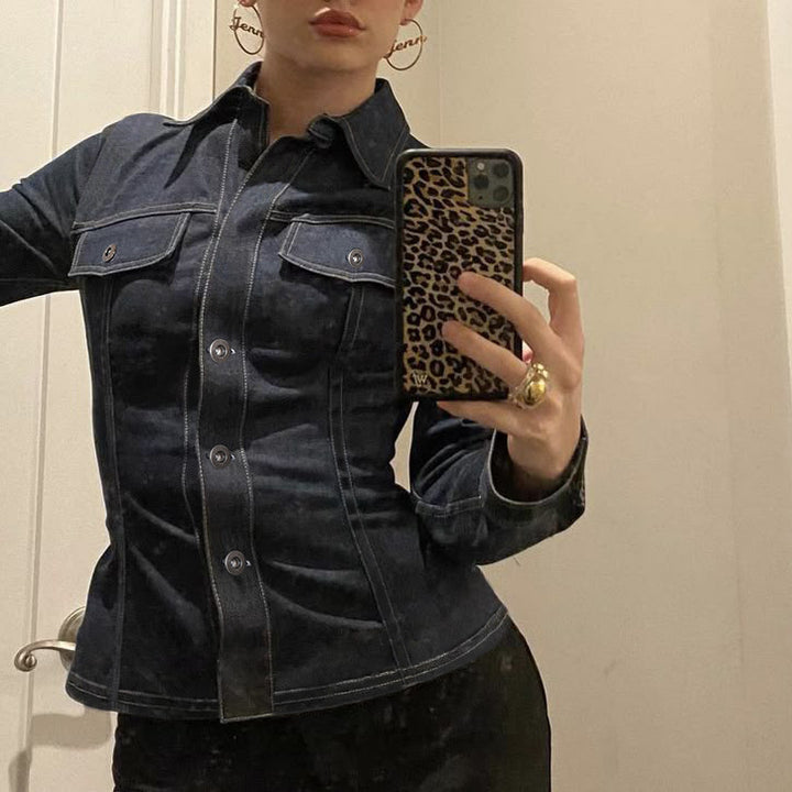 Women's fitted denim jacket with striking contrast seams, chest pockets, and figure-flattering cut Mune Fashion