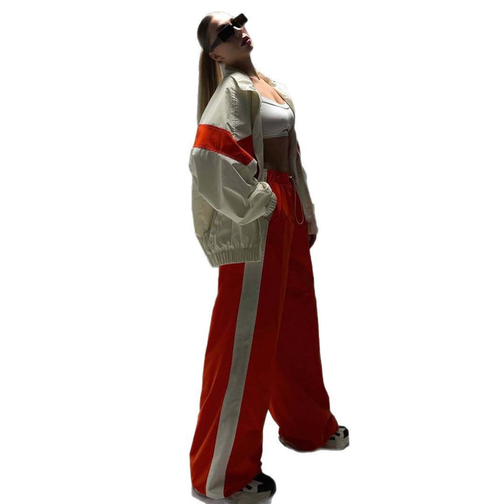 Women's lightweight oversized windbreaker jacket with contrast panels, drawstring hem, and elastic cuffs