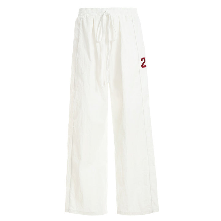 Ladies wide linen trousers with high elastic waistband, drawstring and casual palazzo cut Mune Fashion