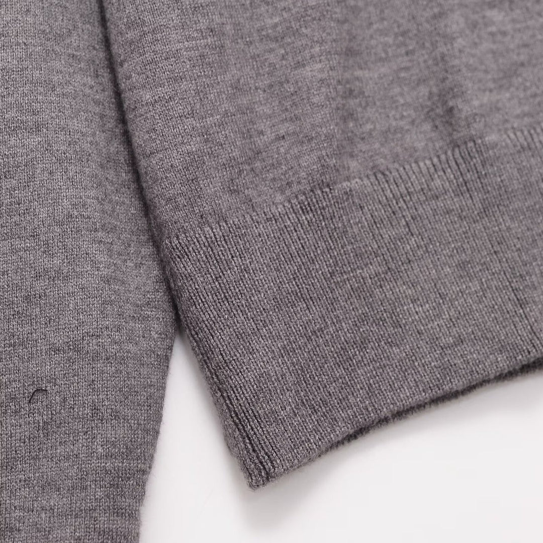 Women’s polo collar fine knit sweater with button placket and ribbed hem Mune Fashion
