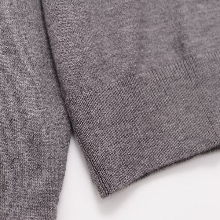 Women’s polo collar fine knit sweater with button placket and ribbed hem Mune Fashion