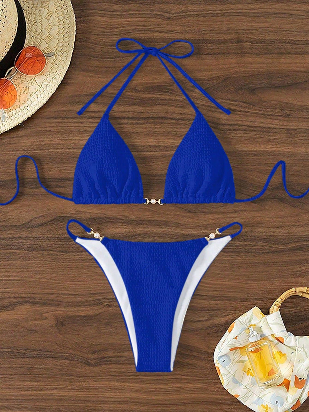 Women's Triangle Bikini with fashionable lacing details and elegant accents Mune Fashion