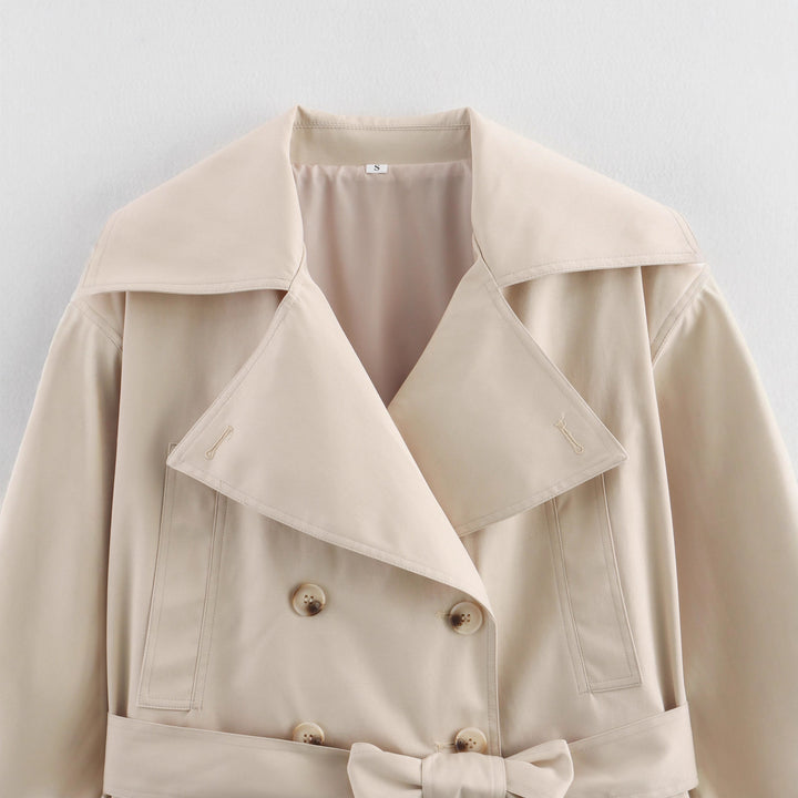 Women Short Cropped Trench Coat with Wide Shawl Collar, Waist Belt to Tie and Decorative Cuffs Mune Fashion