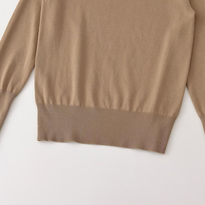 Women's fine knit pullover with stripe pattern, round neckline and decorative button detail Mune Fashion
