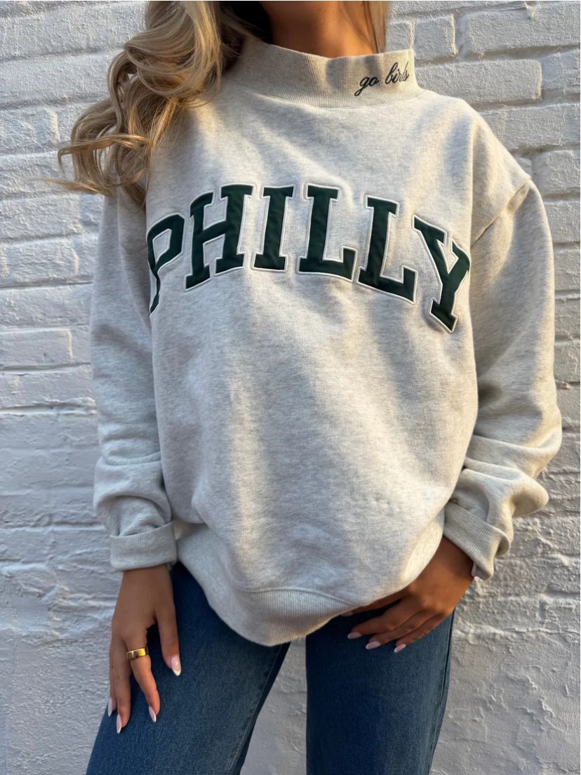 Women's oversized college sweatshirt with high stand-up collar and sewn-on lettering Mune Fashion