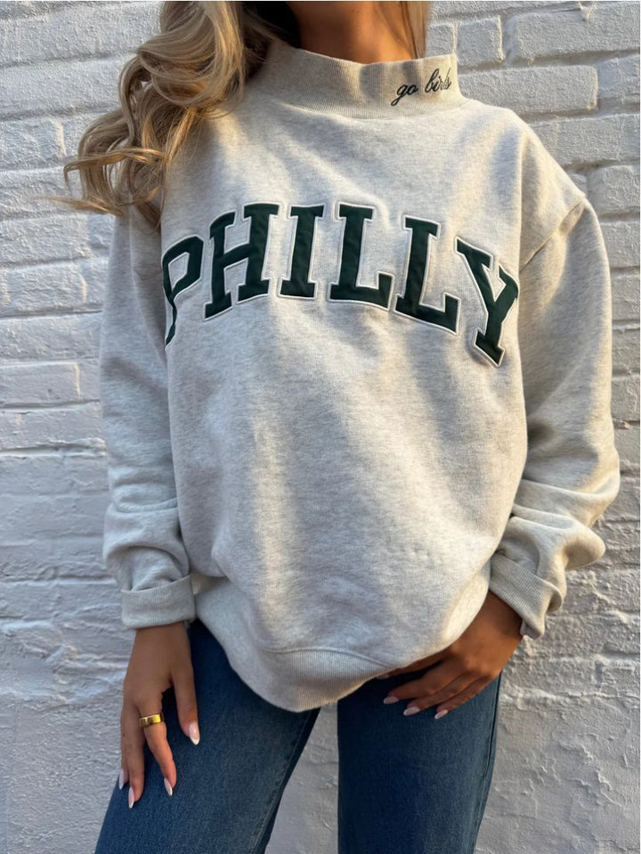 Women's oversized college sweatshirt with high stand-up collar and sewn-on lettering Mune Fashion