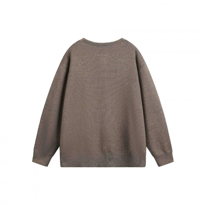 Unisex Oversize fine knit pullover with short Henley closure and structured mélange quality Mune Fashion