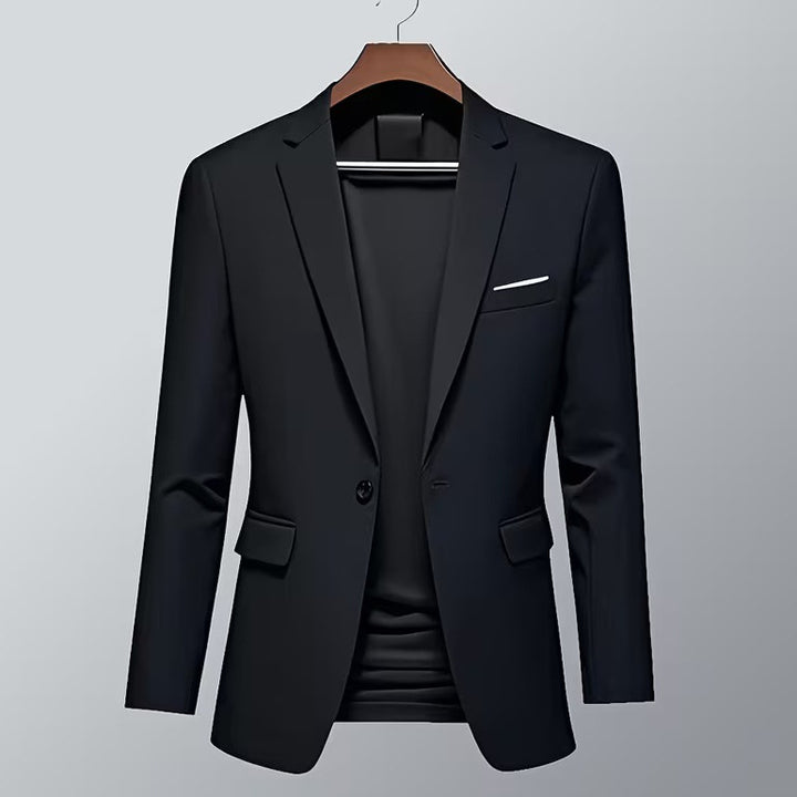 Men's slim-fit tuxedo jacket with prominent lapels, concealed breast piping, and light shoulder padding Mune Fashion