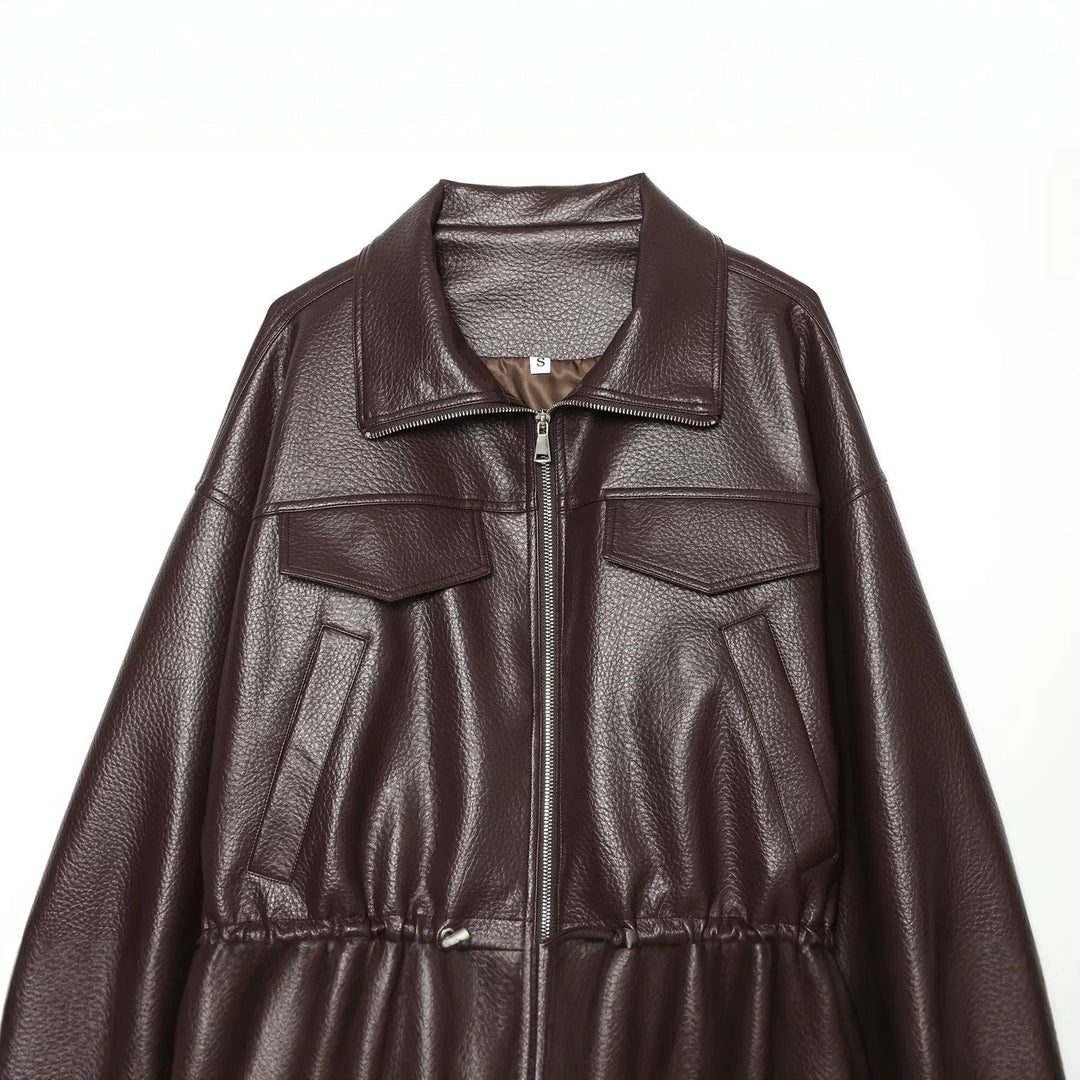 Ladies short jacket made of embossed artificial leather with drawstring waist and flap pockets Drune