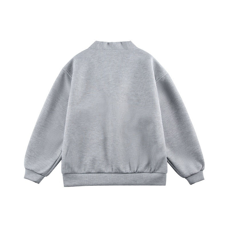 Unisex Boxy knit cardigan in waffle knit with V-neck, continuous button placket, and applied round pockets Mune Fashion