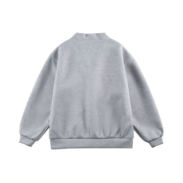 Unisex Boxy knit cardigan in waffle knit with V-neck, continuous button placket, and applied round pockets Mune Fashion