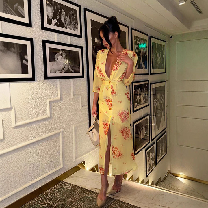 Women's maxi dress with deep V-neckline, tailored corset and high leg slit Mune Fashion