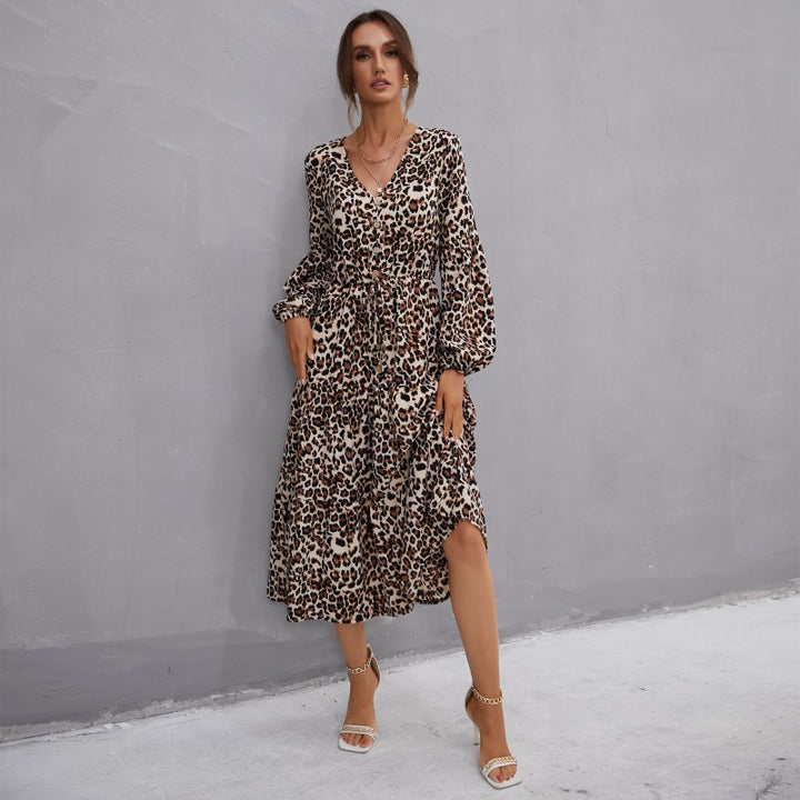 Women’s midi dress in leopard print with V-neckline, button placket, drawstring waist, and tiered skirt Mune Fashion