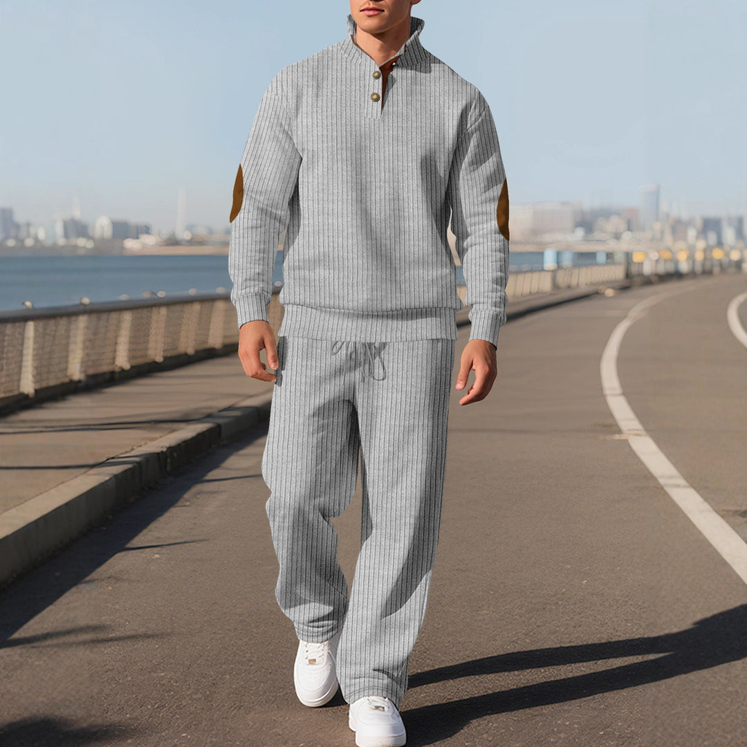 Men's fine ribbed sweater with half button placket, high stand-up collar, and contrasting suede elbow patches Mune Fashion
