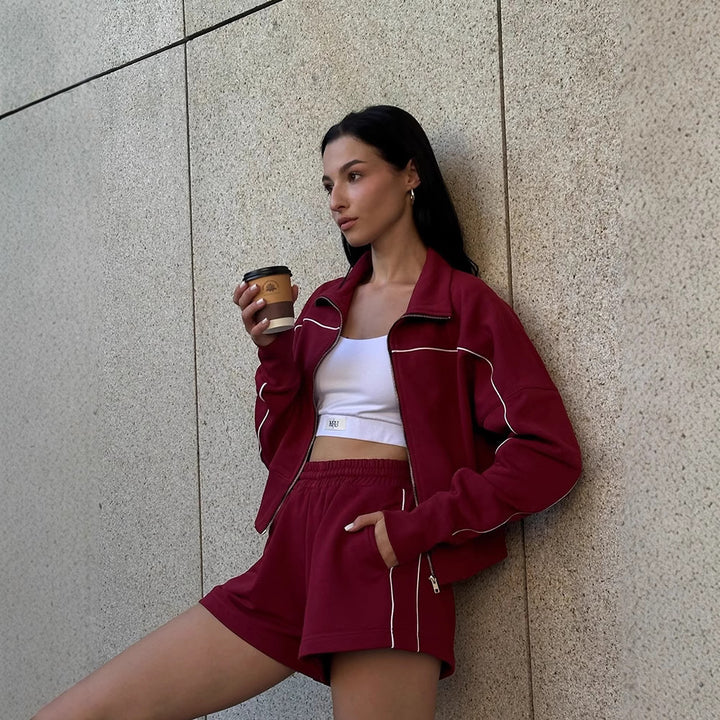 Women nan athletic two-piece with shaping sports bustier, tailored high-waist sweat shorts and zip hoodie Mune Fashion