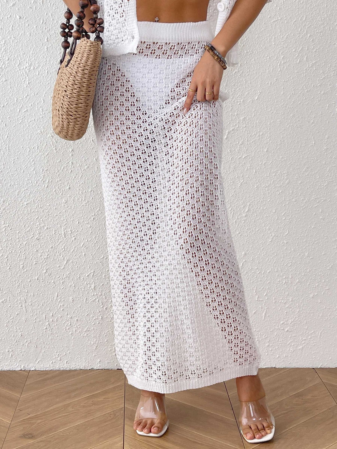 Women’s midi dress made of loose crochet material Mune Fashion