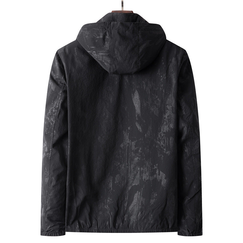 Men's lightweight softshell transitional jacket with hood, water-repellent coating and reflective zippered pockets Mune Fashion