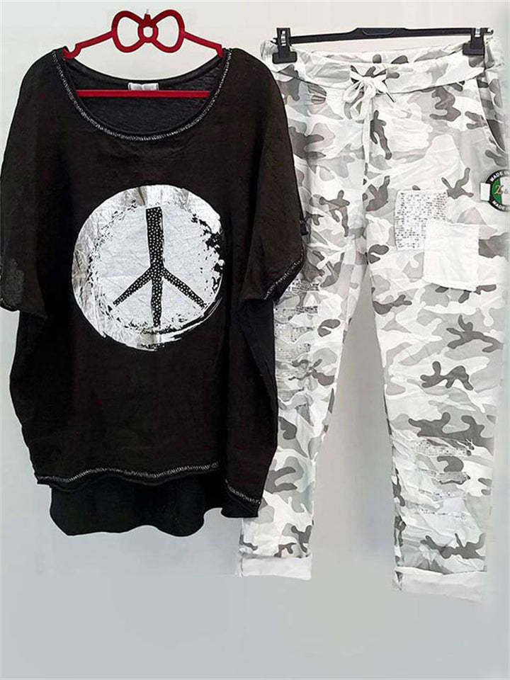 Women’s casual leisure two-piece with wide-cut linen look shirt, peace symbol and camouflage jog pants with patch details Mune Fashion