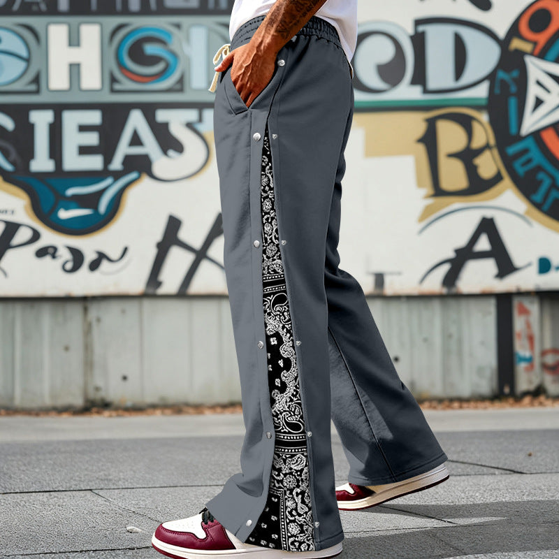 Men's loosely cut snap-front jogging pants with paisley side insert and elastic comfort waistband Mune Fashion
