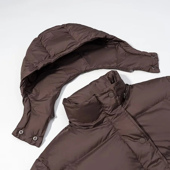 Women's short quilted puffer jacket with removable hood and drawstring hem Mune Fashion