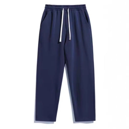Unisex casual straight-leg joggers with elastic comfort waistband, contrasting drawstring and side pockets Mune Fashion