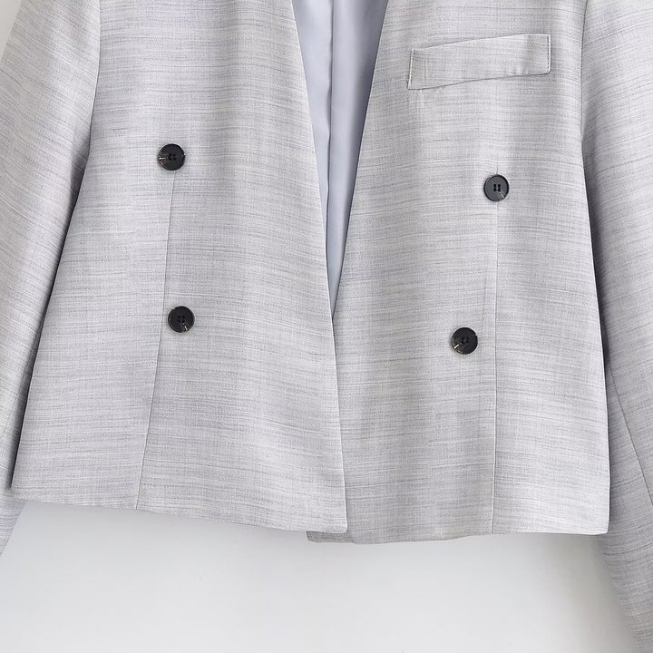 Women's cropped blazer without lapels with double-breasted button placket and boxy silhouette Mune Fashion