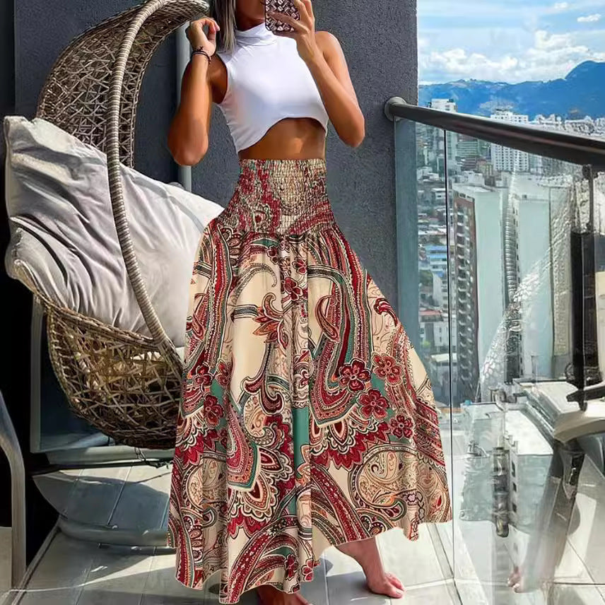 Ladies nan maxi skirt with high smocked waist and flowing boho pleated look Mune Fashion