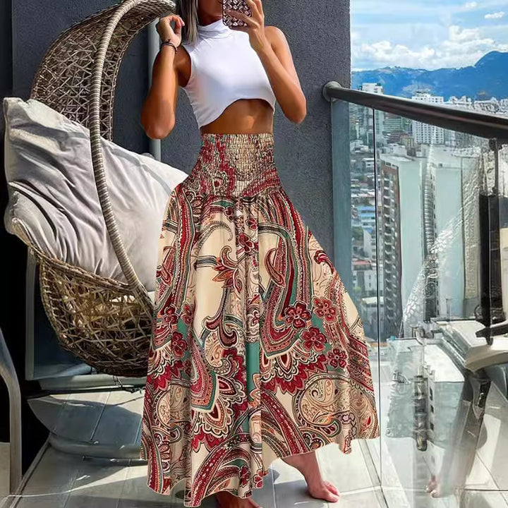 Ladies nan maxi skirt with high smocked waist and flowing boho pleated look Mune Fashion